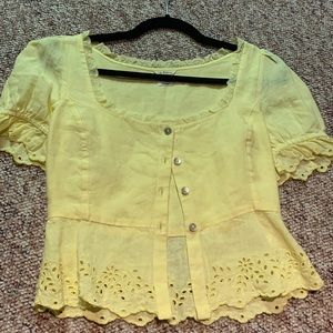 Yellow button up top